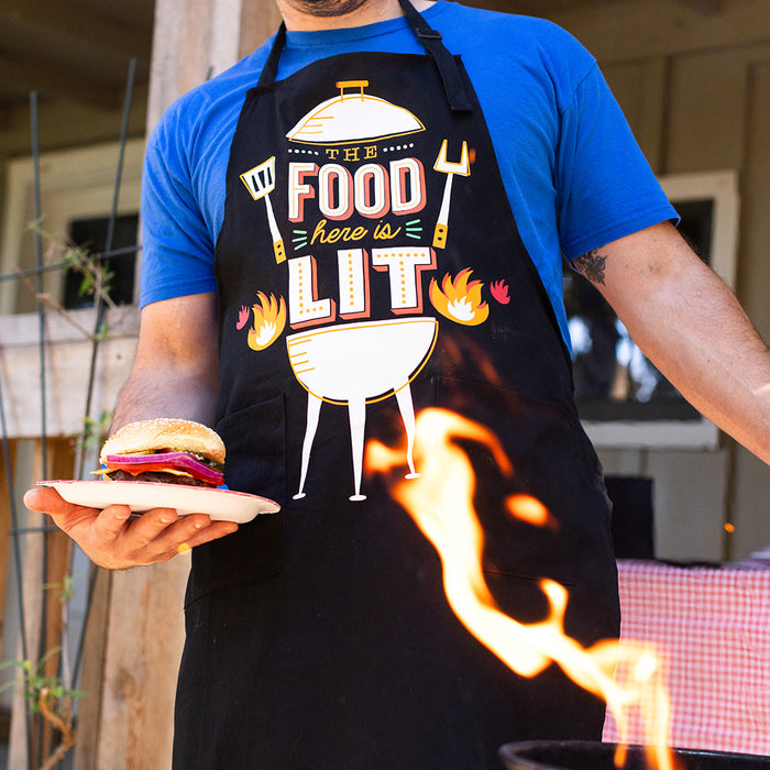 The Food Here Is Lit Apron - Funny Grilling Apron